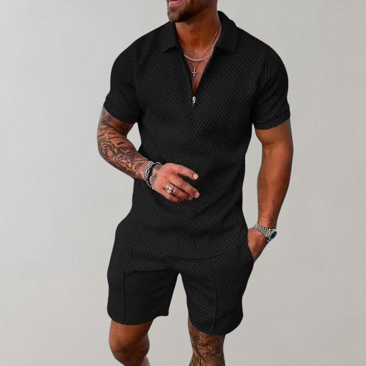 Men's stylish polo and shorts summer outfit in navy, perfect for warm weather casual wear or relaxed smart casual events.