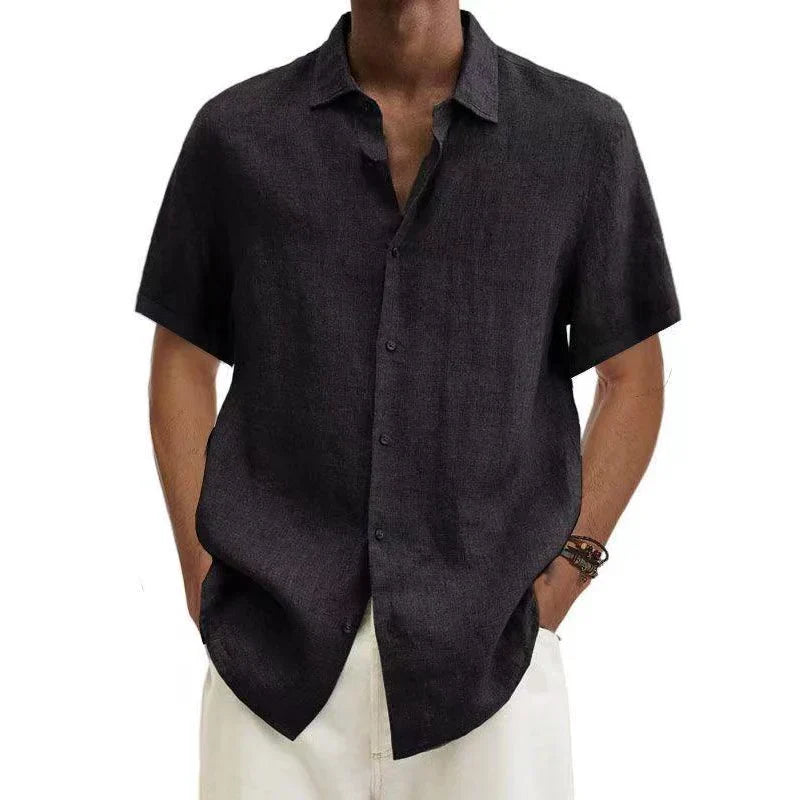 Versatile men's button down shirt, ideal for both casual and formal wear. Timeless style, relaxed fit.