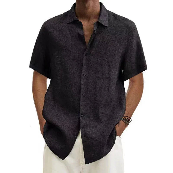 Versatile men's button down shirt, ideal for both casual and formal wear. Timeless style, relaxed fit.