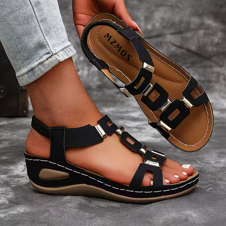 Graceful open-toe platform sandals, white, with a stylish ankle strap for summer fashion.