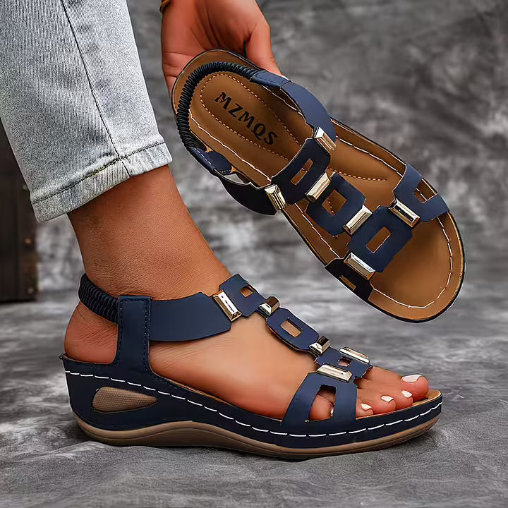 Fashionable white platform sandals, open toe, designed with a delicate ankle strap detail.