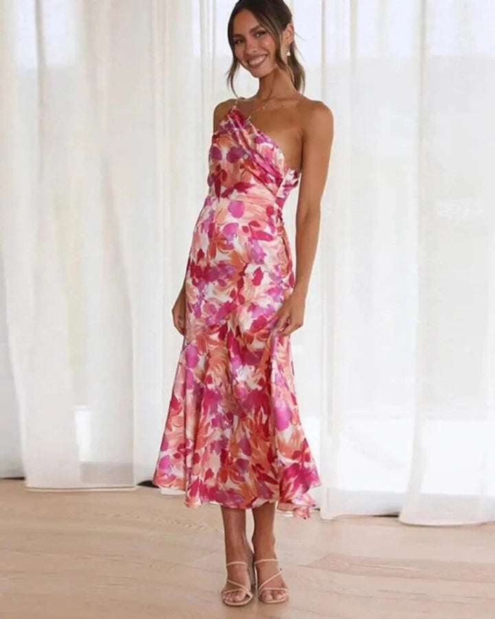 Elegant women's asymmetric floral midi dress with one shoulder & trumpet skirt, perfect for summer events & parties.