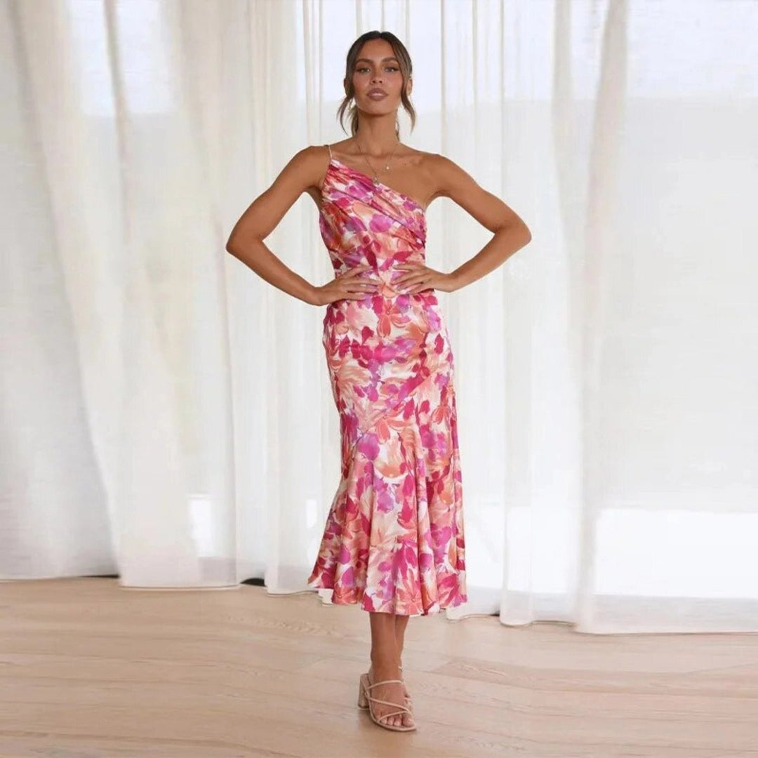 Sophisticated women's asymmetric floral midi dress, one-shoulder, ideal for elegant event wear & summer occasions.