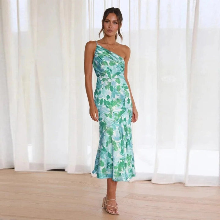 Stylish women's floral midi dress, asymmetric one-shoulder design with trumpet skirt. Ideal for wedding guests.