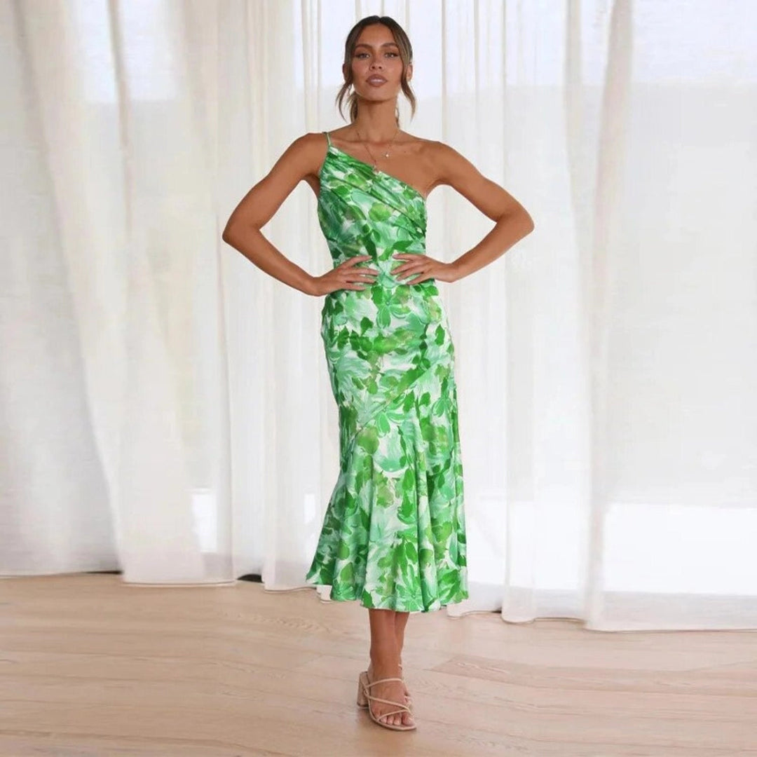 Chic women's floral midi dress featuring an asymmetric neckline & one shoulder, elegant for events & summer.
