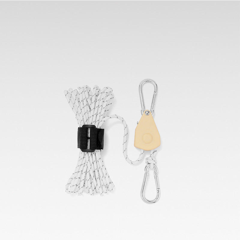 Reflective adjustable camping rope, ideal for securing tents & outdoor gear at night.