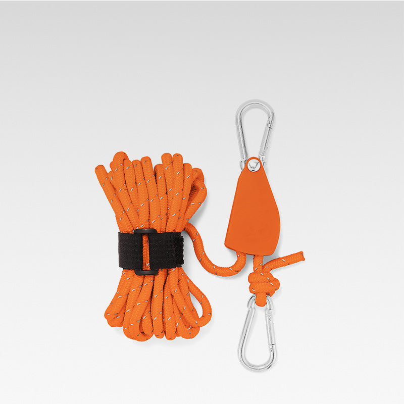 Adjustable reflective camping rope for survival kits, ensuring visible tent setup & safety.