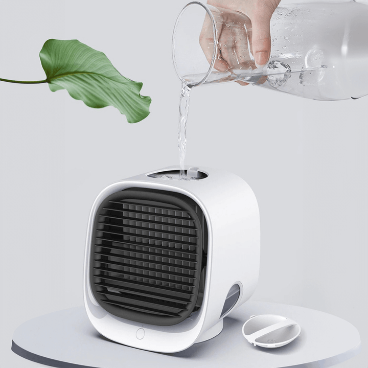 Mini portable air cooler, humidifier, & air purifier. Personal cooling device for car, home, and office use.