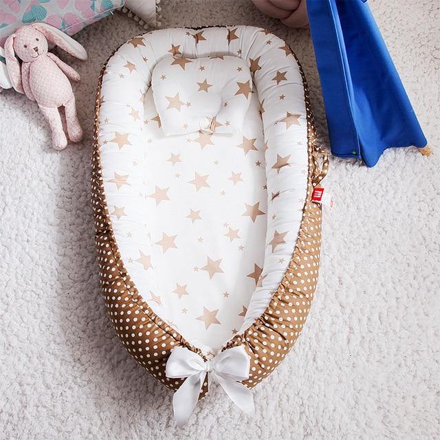 Cozy portable baby snuggle nest, ideal for newborns. A versatile infant nest & safe sleeper, perfect for nursery use.