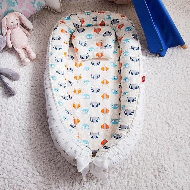 Travel-friendly baby lounger and portable bassinet. Ensures safe sleep for infants on the go. A newborn nursery essential.