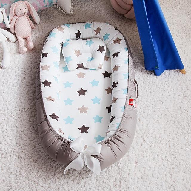 Comfortable infant nest and baby bed, perfect for newborns. A portable snuggle lounger for safe, cozy sleep and play.