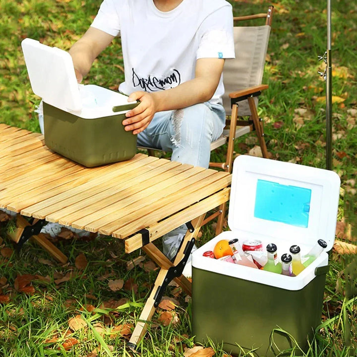 Camping gear essential: portable electric cooler warmer to keep food and drinks at optimal temperature.