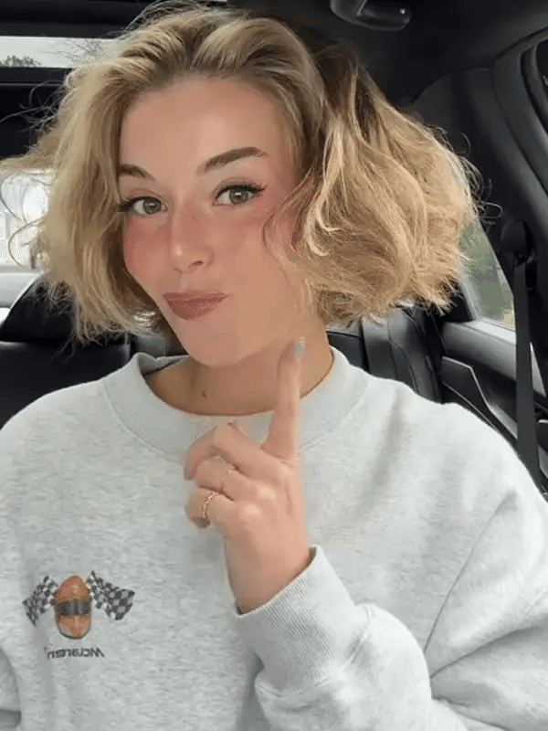 Sleek women's portable electric hair styling brush, designed for smooth, healthy, salon-quality hair.