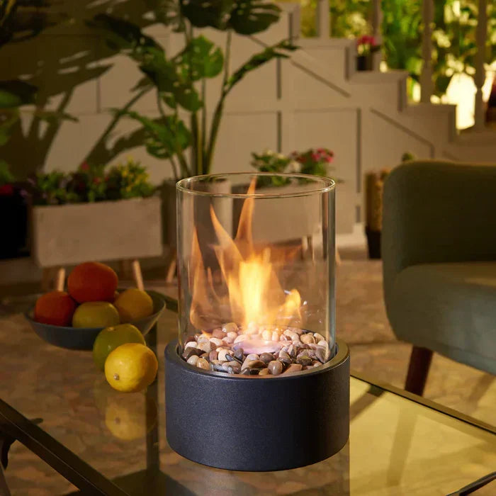 Portable table fire lantern for home and patio ambiance, modern design with real flames.