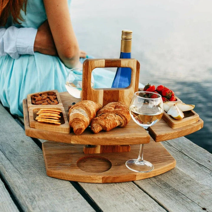 Foldable outdoor serving table, ideal for picnics, parties, and travel.