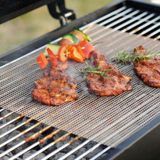 Premium non-stick grill mat for easy cleaning, heat resistant outdoor BBQ cooking.