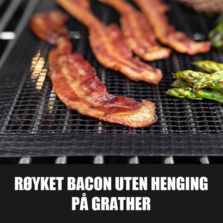 Versatile premium cooking mat for grilling, heat resistant and ensures even food cooking.