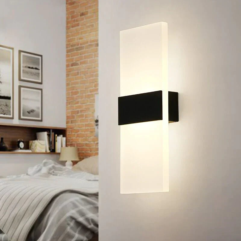 Rechargeable LED wall light with smart motion & touch sensors, creating ambient indoor lighting.
