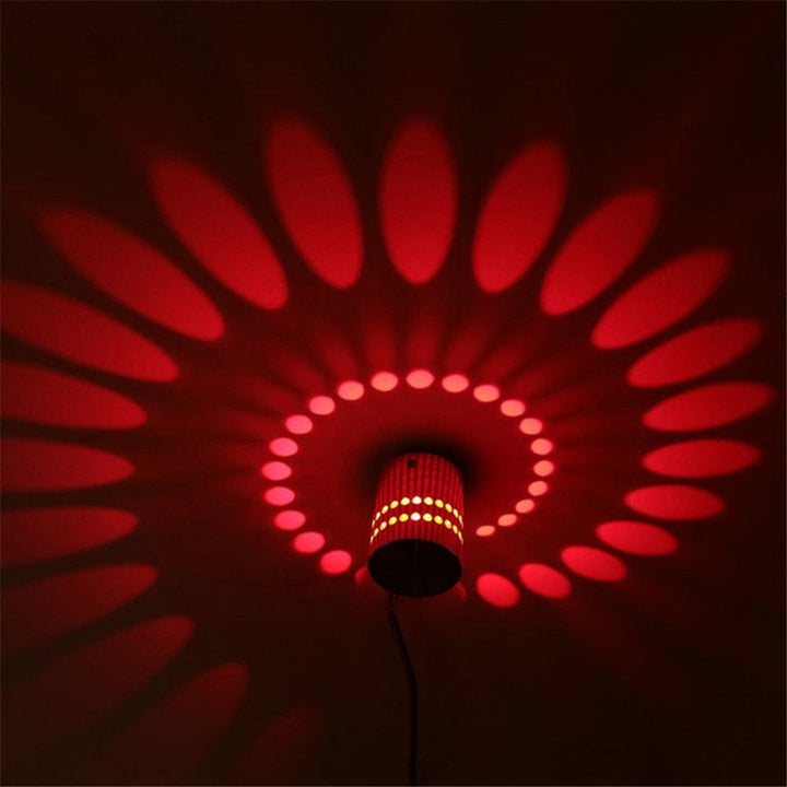 Ambient glow from spiral LED wall/ceiling light. Energy-saving Nvroome lighting for modern home decor.
