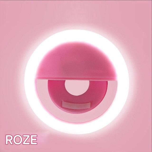 Portable LED selfie ring light that clips onto phones for brighter, professional-looking photos.
