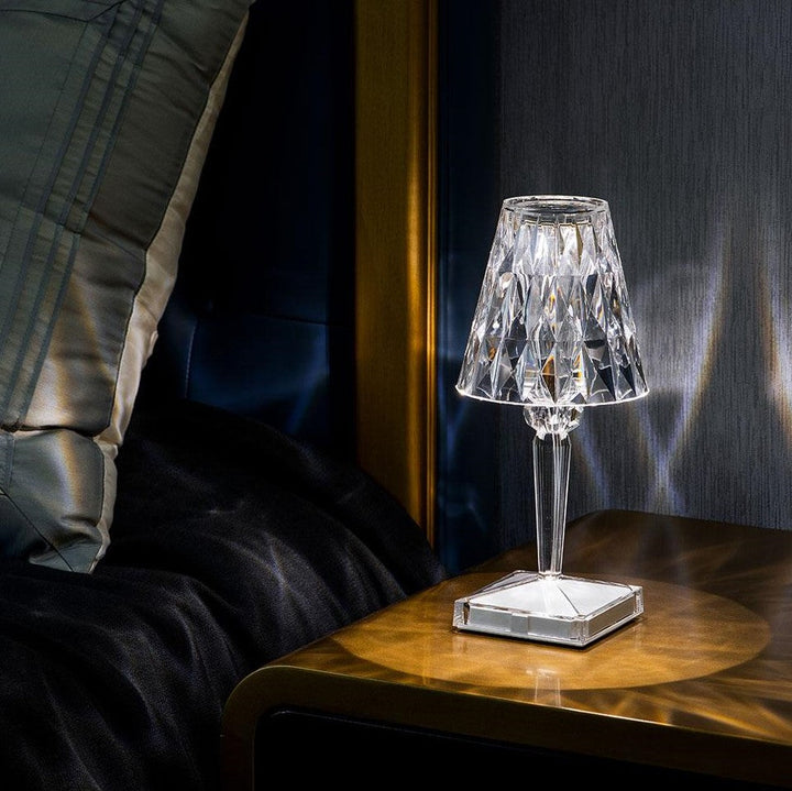 Modern LED crystal lamp, rechargeable, touch dimming for bedroom or living room decor.