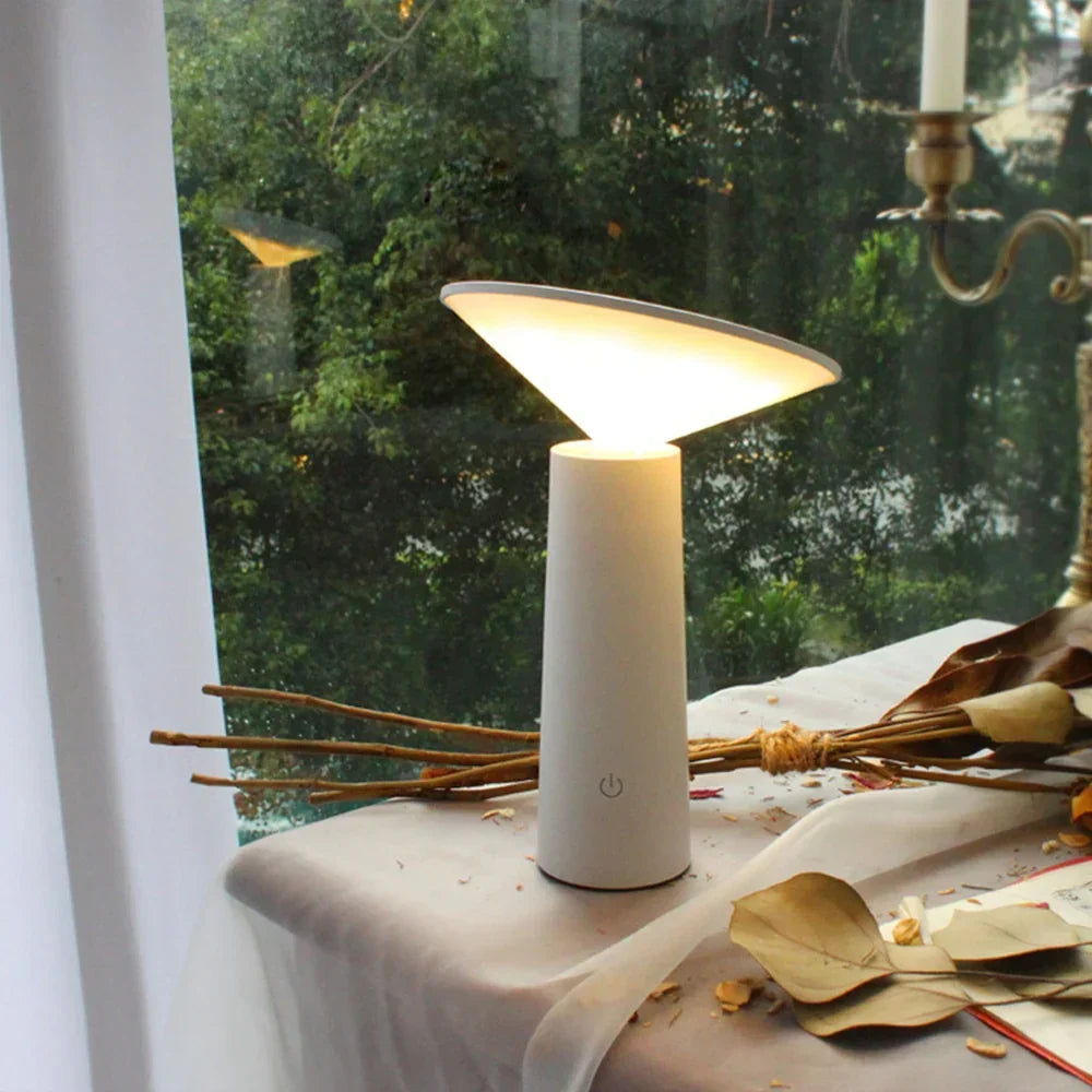 Sleek wireless LED table lamp, flexible, dimmable, ideal for modern desks.