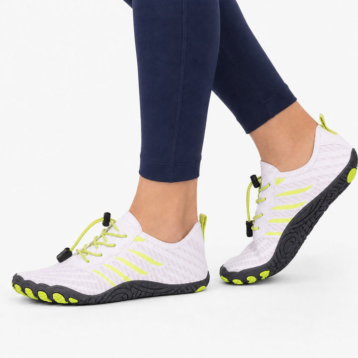 Casual women's barefoot shoes featuring quick lace system and wide toe box.