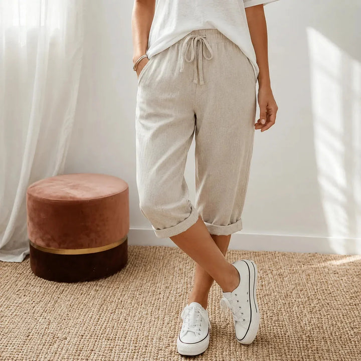 Casual women's capris with comfortable elastic waist & stylish folded cuff, perfect for summer.