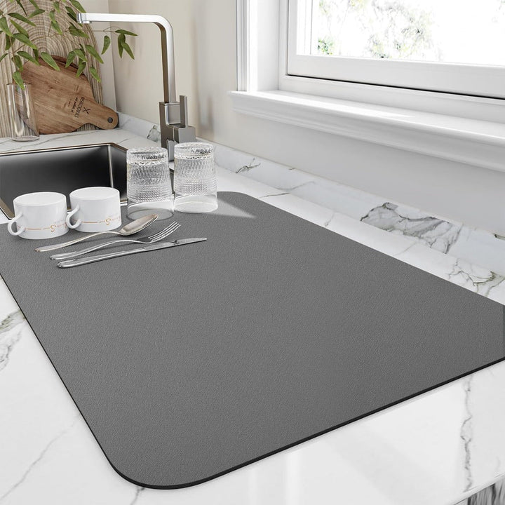 Revolutionary quick dry dish mat for kitchen countertops. Super absorbent diatomite ensures speedy dish drying.