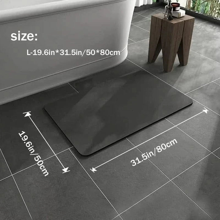 Absorbent non-slip diatomite bath mat for a safe, quick-dry bathroom floor. Modern & hygienic design.