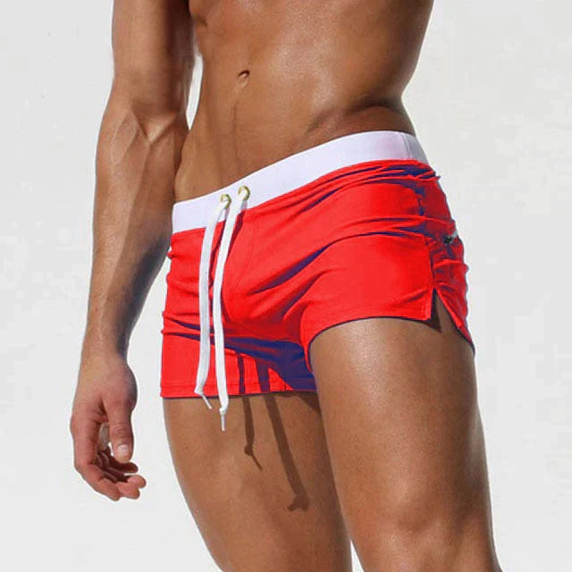 Modern men's quick-drying swim shorts, featuring an adjustable drawstring and a comfortable fit for summer fashion.