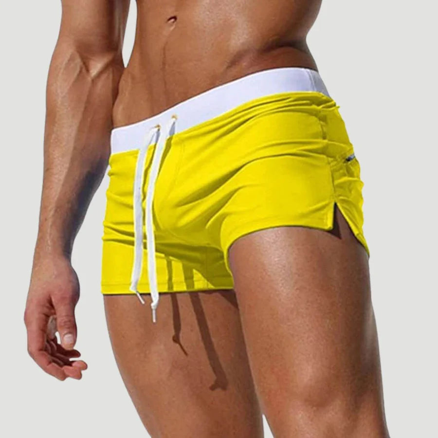 Stylish men's activewear swim shorts, quick-drying fabric & adjustable drawstring, ideal for summer beach fashion.