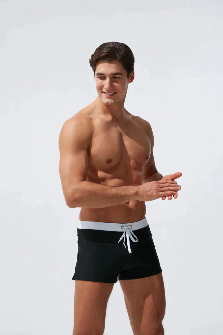 Lightweight men's quick-dry beach shorts with an adjustable drawstring for a secure, comfortable fit. Great for summer.