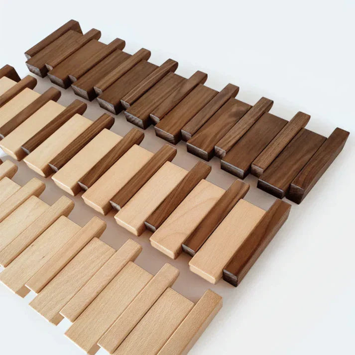 Stylish piano key coat rack, wall-mounted entryway organizer. Perfect modern home decor & storage solution.