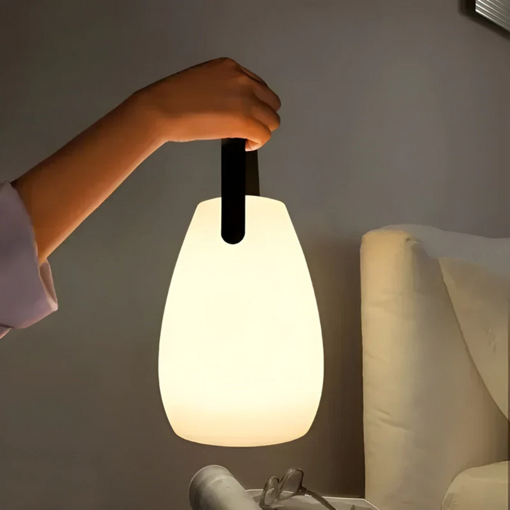 RadianceFlex portable wireless LED table lamp, perfect for indoor & outdoor use, modern design.
