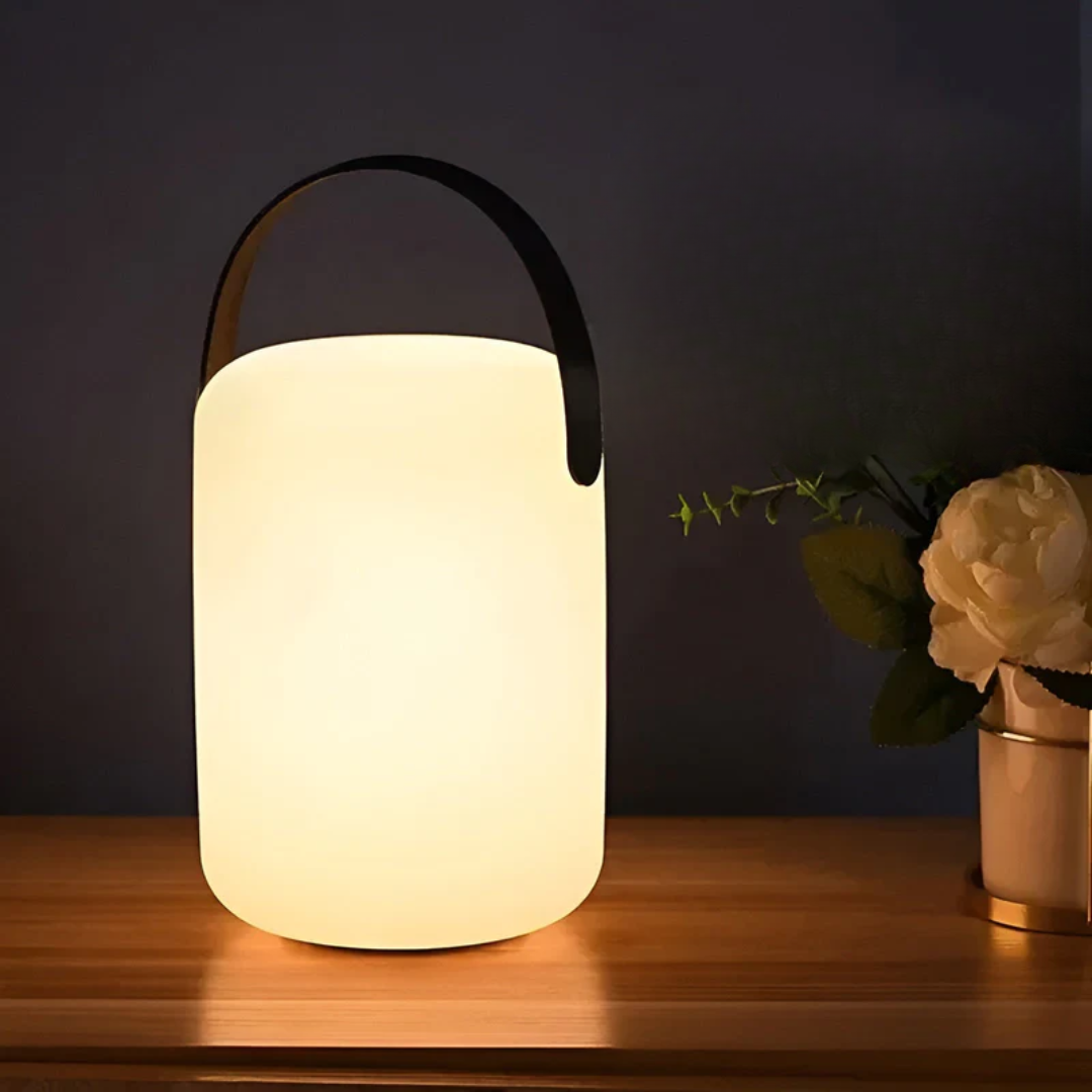 Convenient RadianceFlex wireless rechargeable table lamp, portable & waterproof for flexible lighting anywhere.