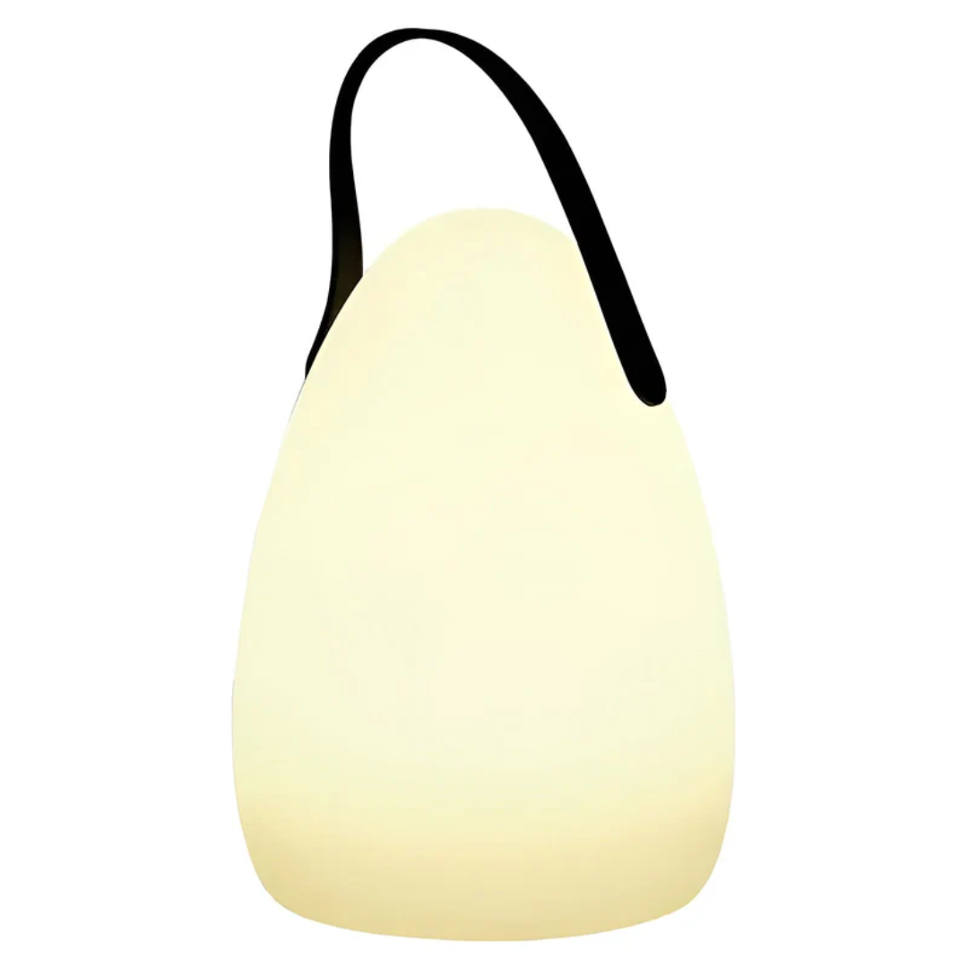 Decorative RadianceFlex table lamp creating cozy ambiance, wireless, portable, and waterproof for versatile decor.