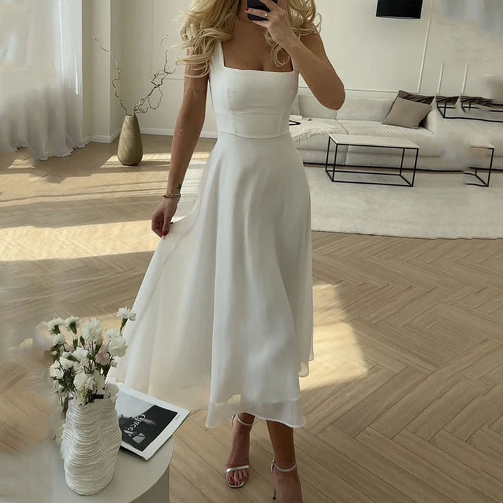 Elegant women's square neck sleeveless A-line midi dress, perfect for summer occasions & party wear.
