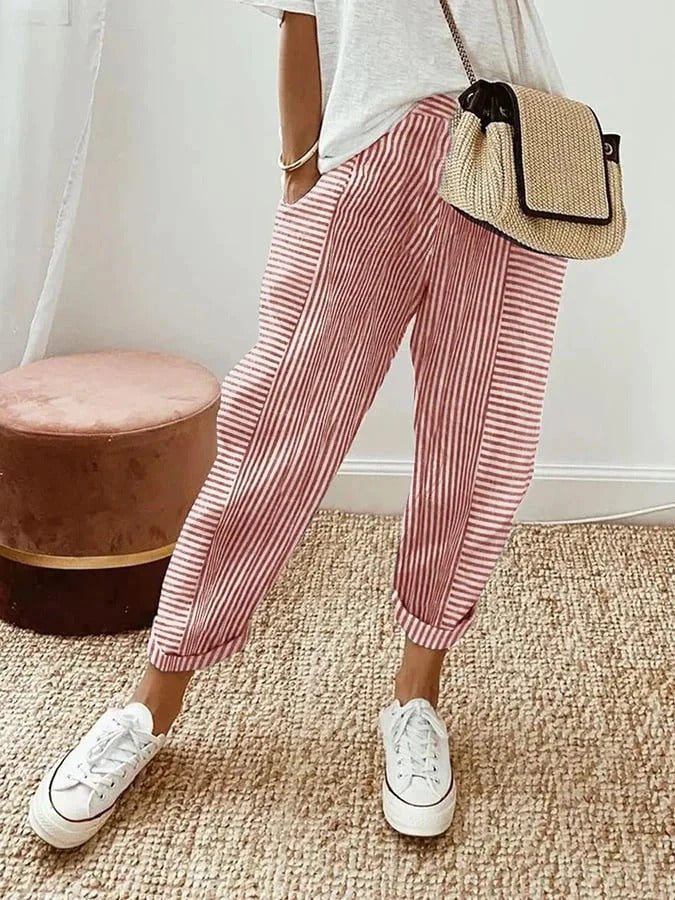 Women's relaxed striped summer pants, ideal for comfortable casual wear. Flowy elastic waist style.