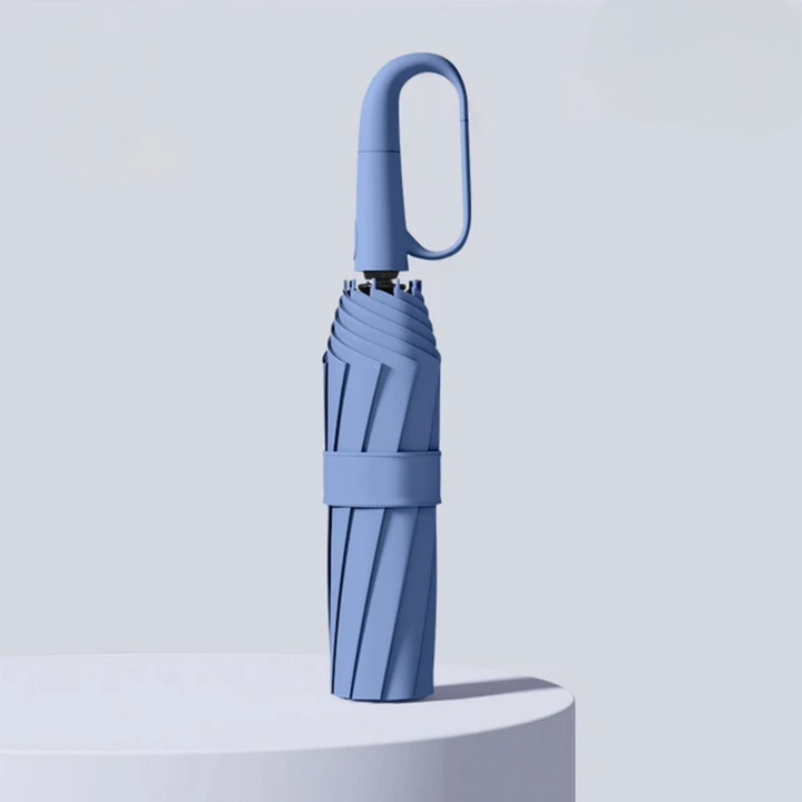 Compact StormShield umbrella with reflective accents, offering superior rain protection.