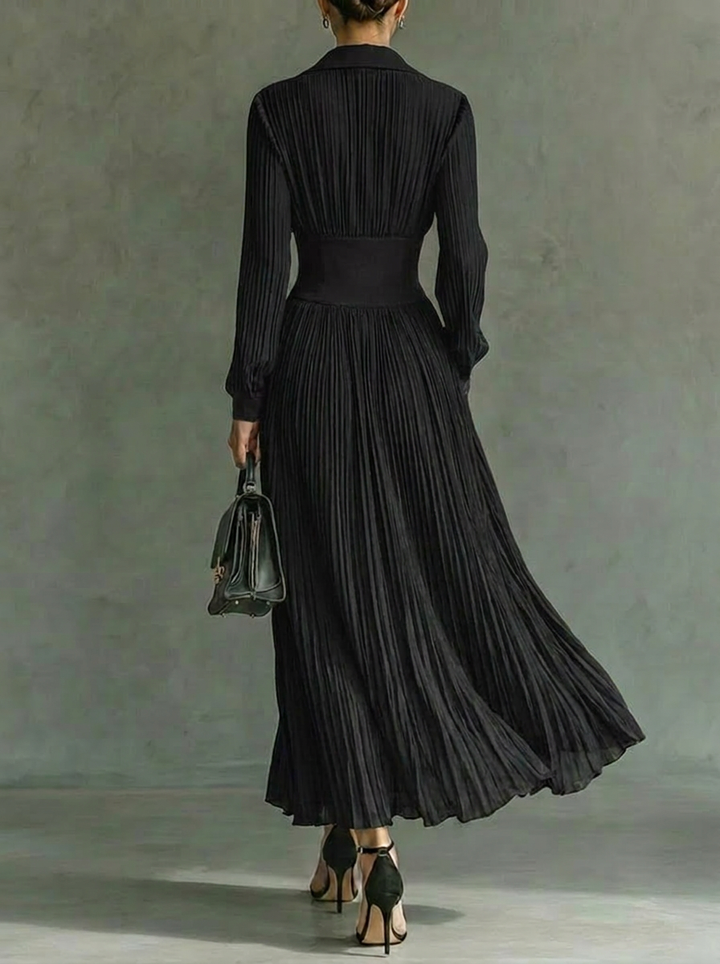 Flowing green pleated maxi dress with a sophisticated collar, ideal for race day or evening events.