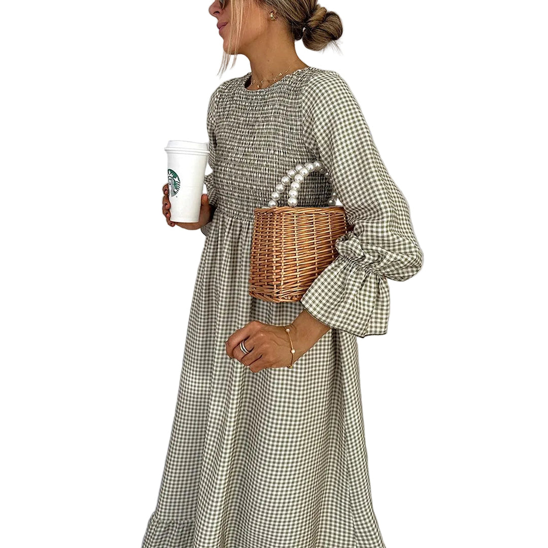 Women's gingham smocked maxi dress with an elegant A-line silhouette, perfect for versatile casual wear.