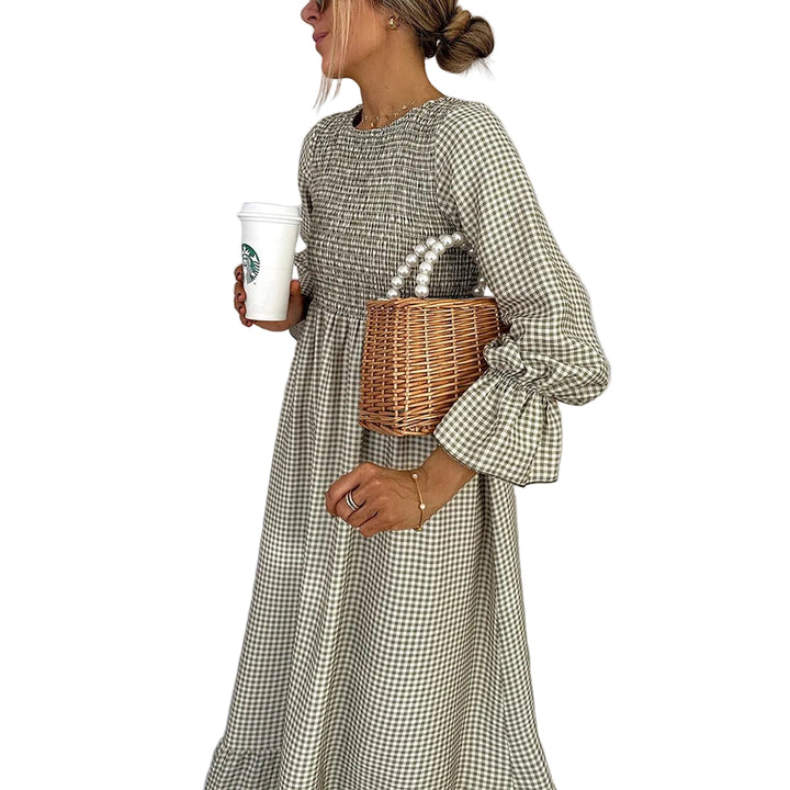 Women's gingham smocked maxi dress with an elegant A-line silhouette, perfect for versatile casual wear.