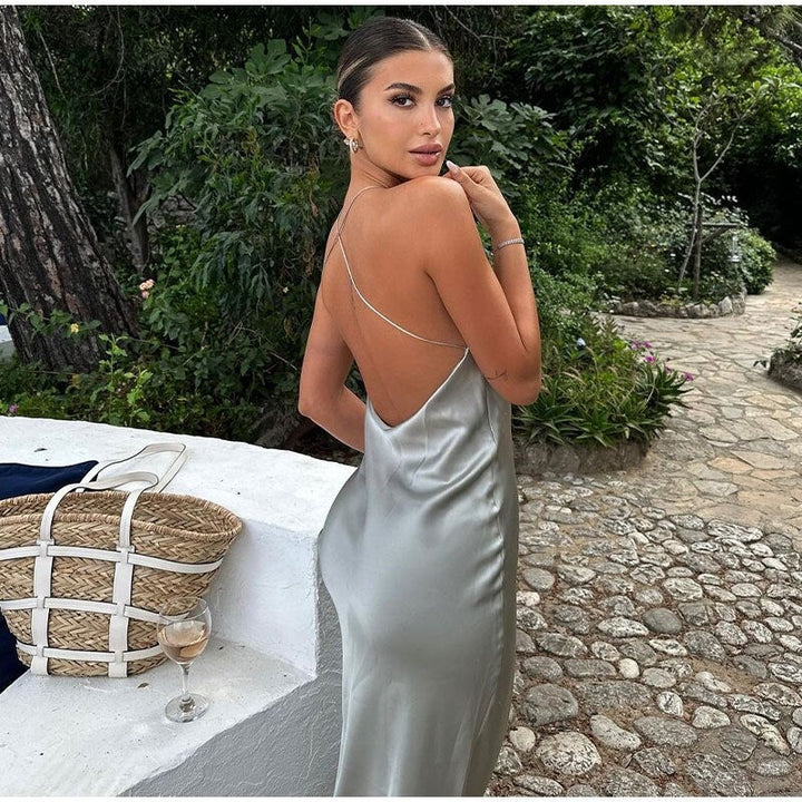Stylish women's halter neck maxi dress, a versatile elegant gown for formal dinners & special events.
