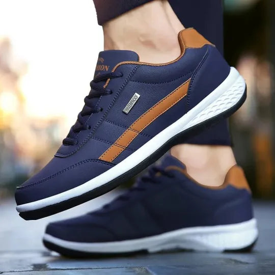 Sporty men's red orthopedic sneakers, cushioned for active comfort and stability.