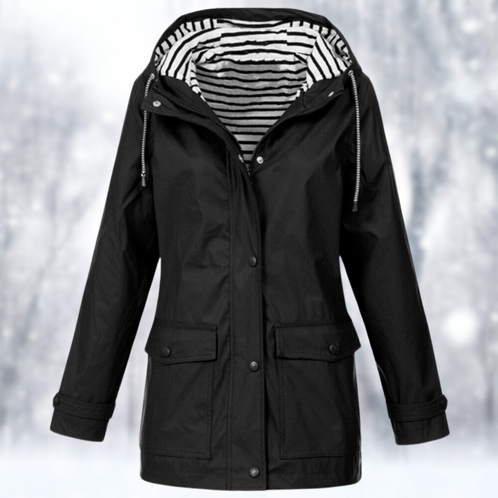 Detail of women's weather-protection rain jacket fabric. Durable, lightweight windbreaker for all-season outdoor wear.
