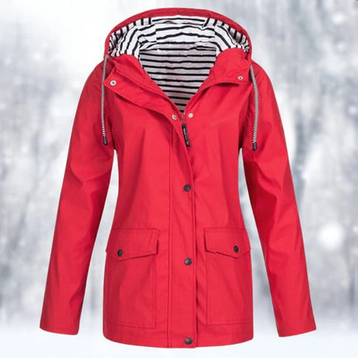 Women's casual rain jacket. Stylish, lightweight windbreaker providing weather protection for spring/fall outdoor activities.