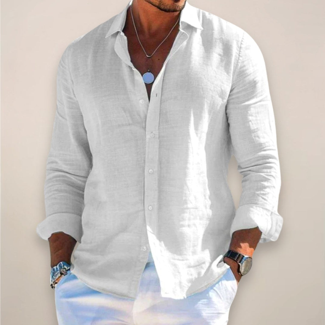 Classic men's everyday button-up shirt, offering comfortable wear with a relaxed fit. Great for casual style.