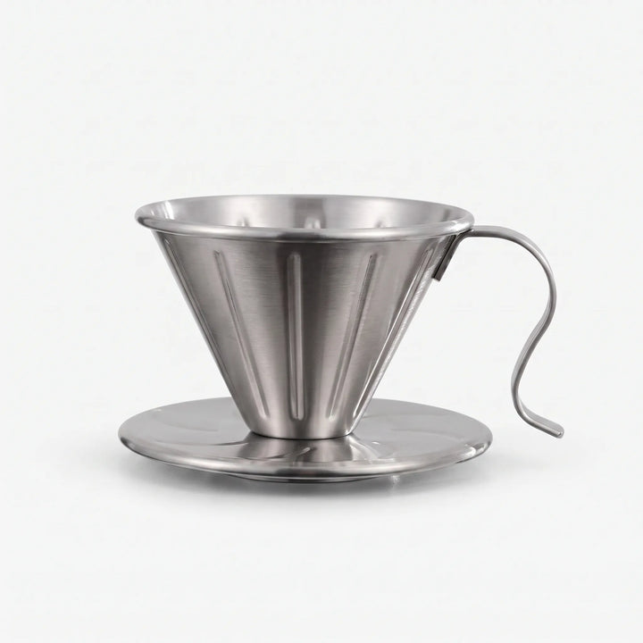 Stainless steel ribbed pour-over coffee dripper for perfect home brewing.