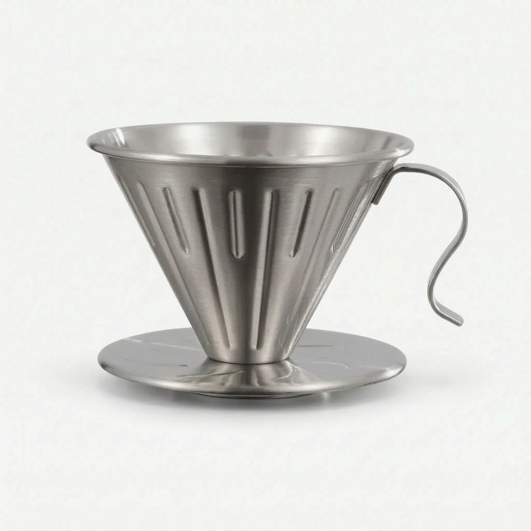 Durable stainless steel ribbed pour-over coffee dripper, a sleek kitchen tool for brewing.